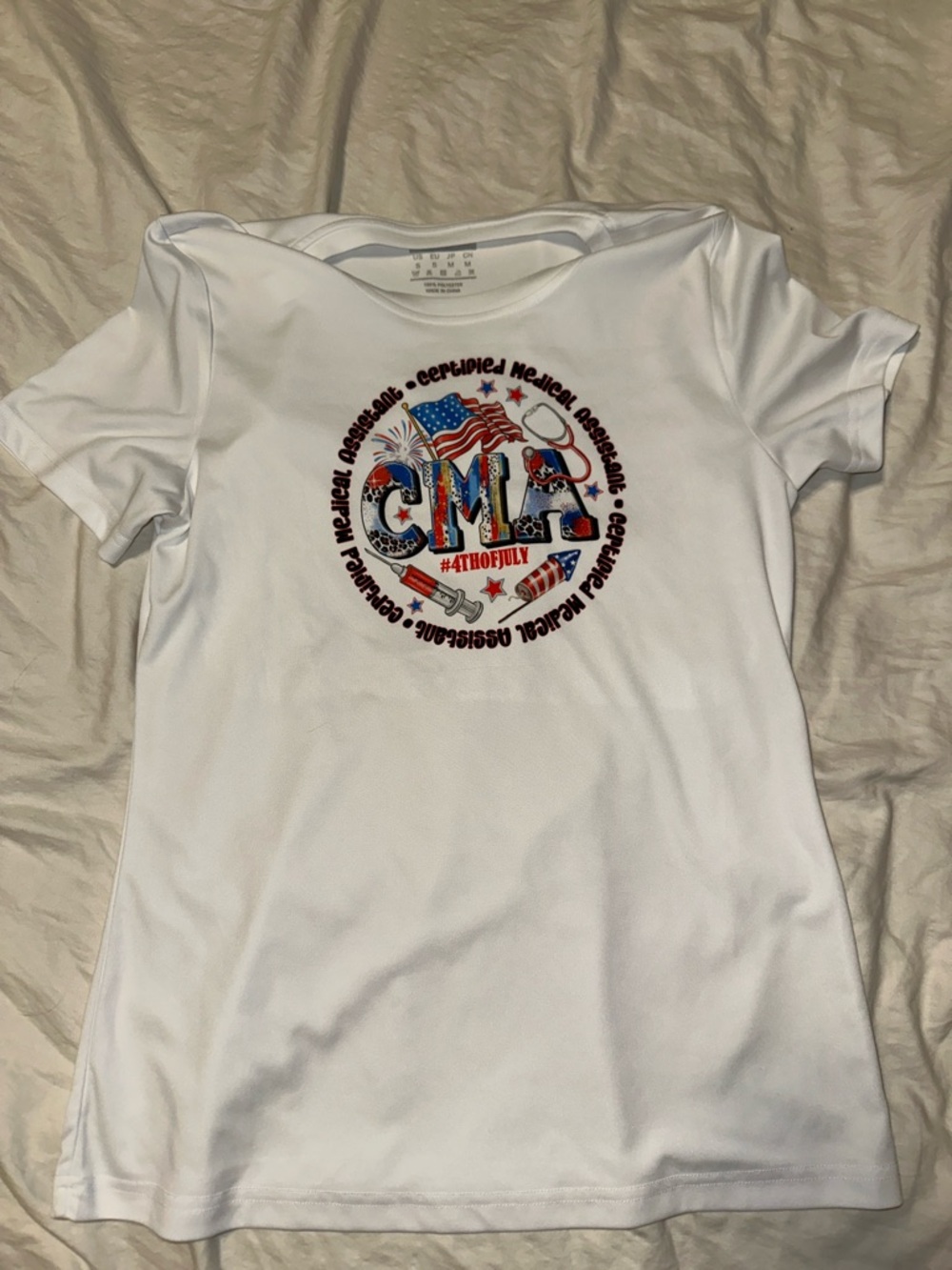 CMA Graphic Tee with American Flag Design - White